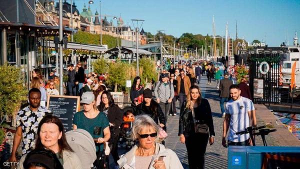 دولة تثير حيرة العالم .. إصابات أقل بكورونا رغم غياب القيود الصارمة